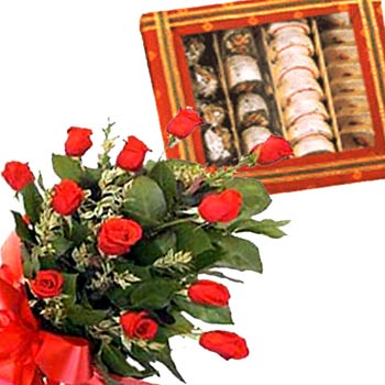 Hamper includes 1kg  Kaju roll and Bouquet of 10 Mixed color roses.